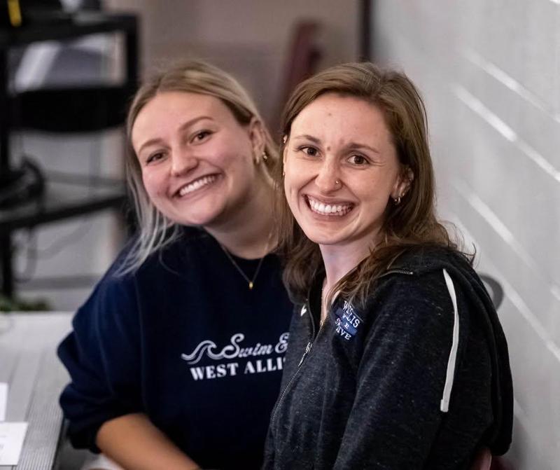 two girls smiling