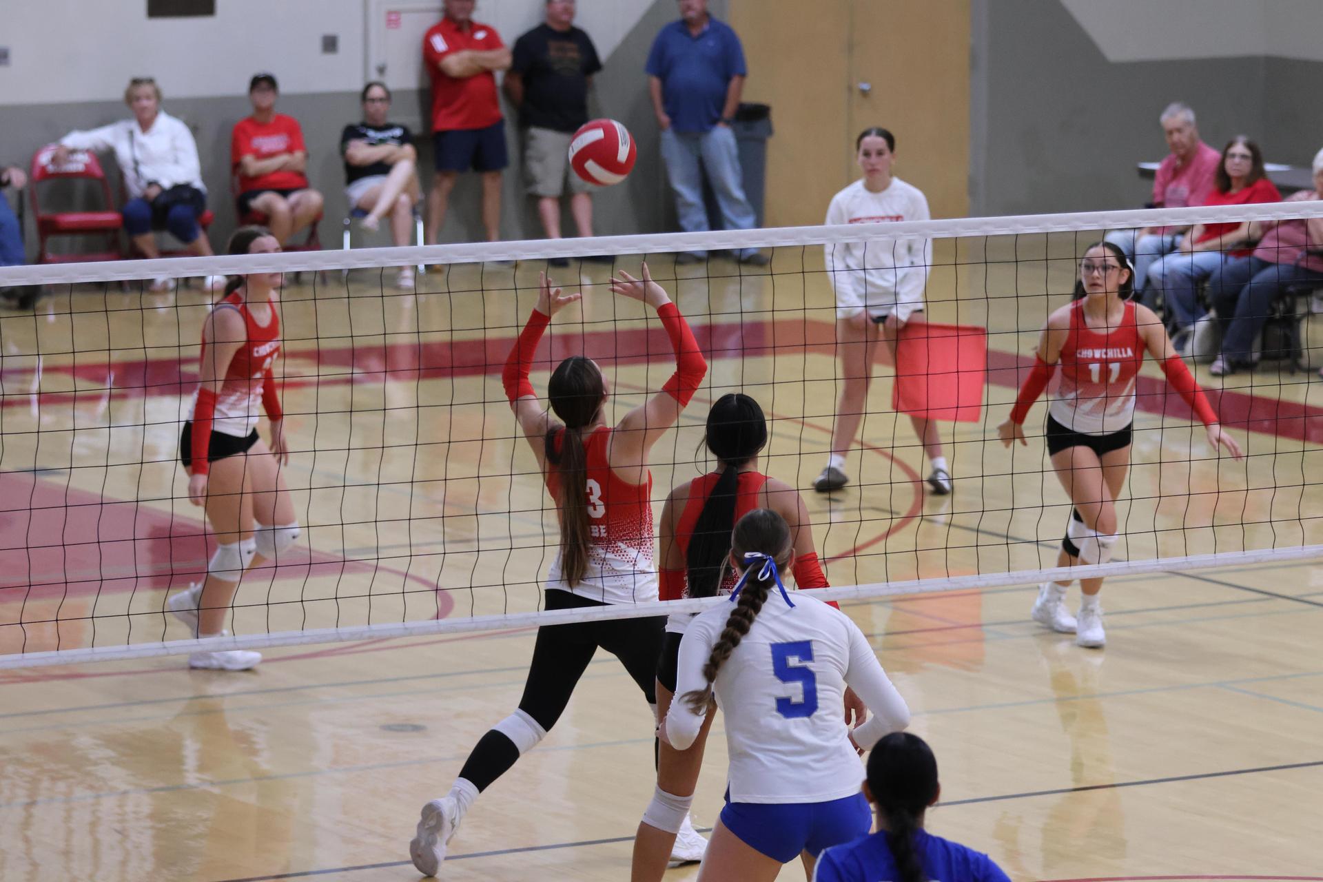 Varsity girls Volleyball playing vs. Madera 23