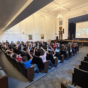 Nearly every student hand shot up to participate in the discussion