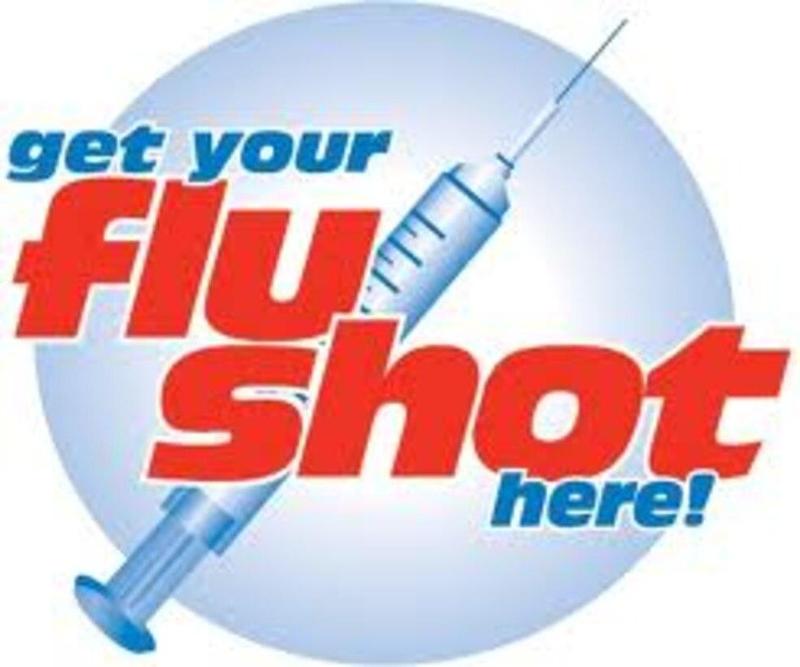 a shot with the words flu shot written around it