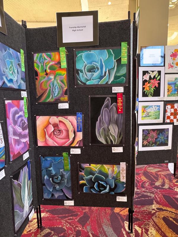 Collection of Memorial student artwork displayed at Lubbock Arts Festival