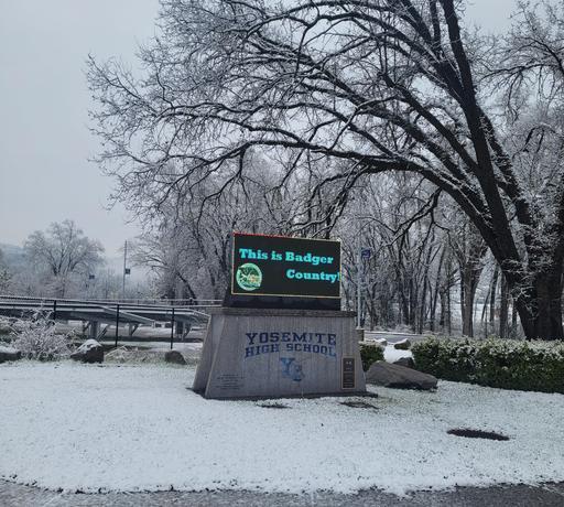 picture of YHS marque surrounded by snow