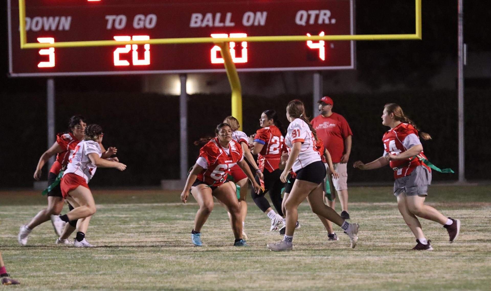 girls playing flag football