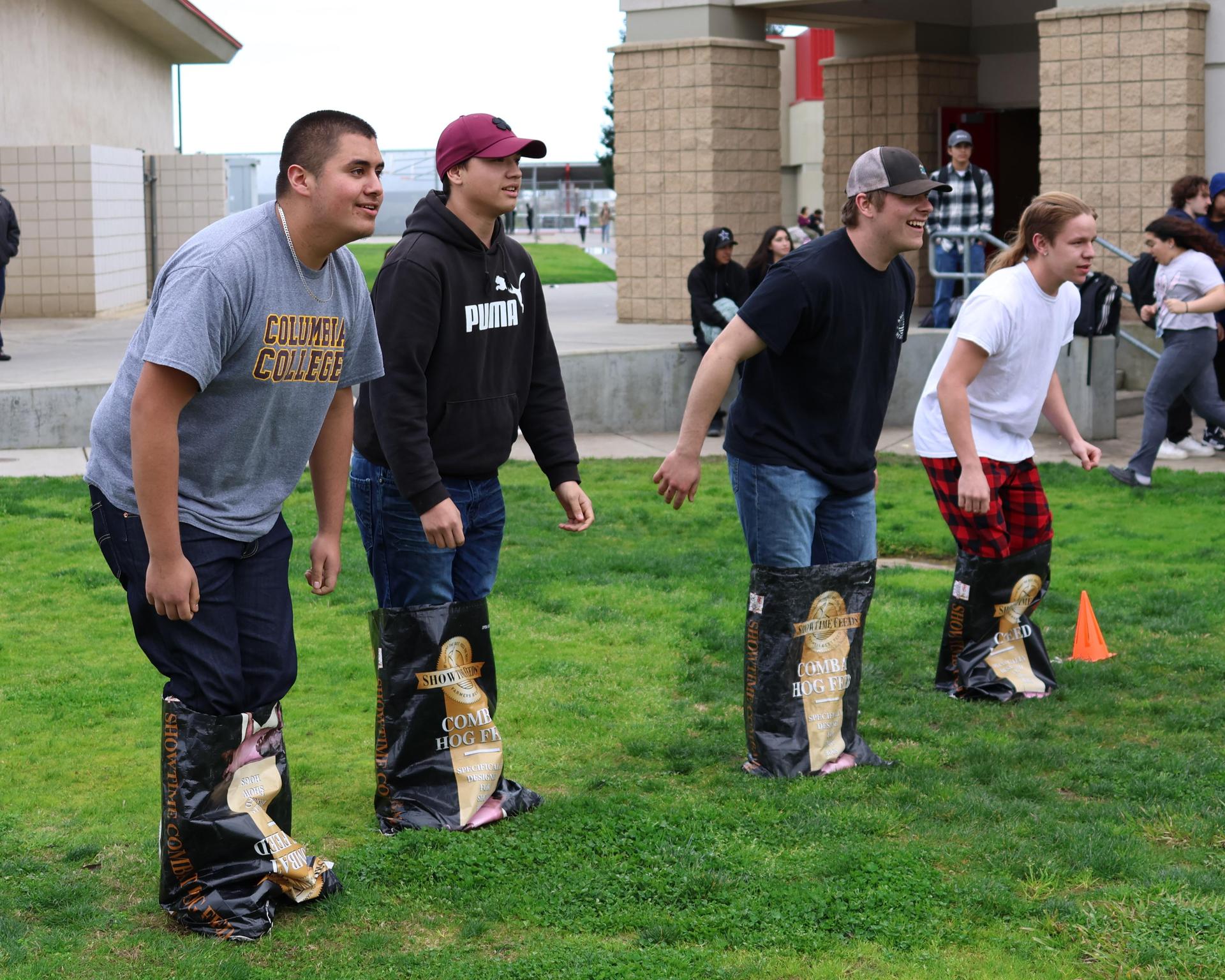students and staff enjoying the feed bag relay