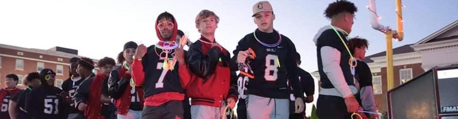 MHS football team participated in the Glowing Graves Parade. Such a fun night!