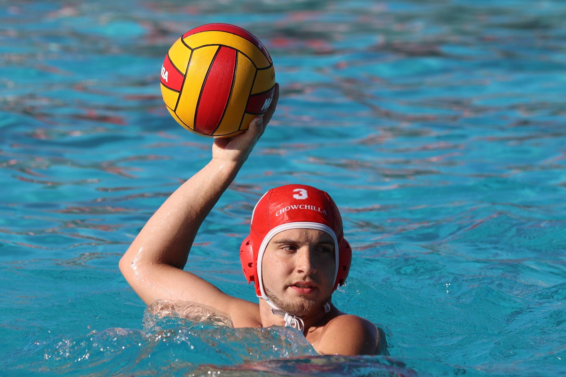 boys playing water polo against Madera