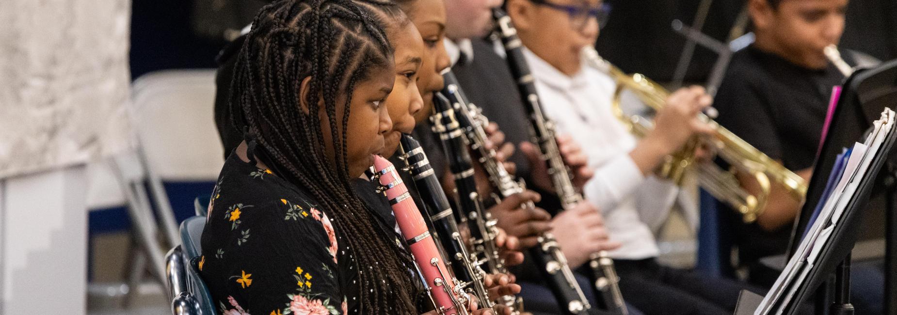 Elementary students participate in a band concert