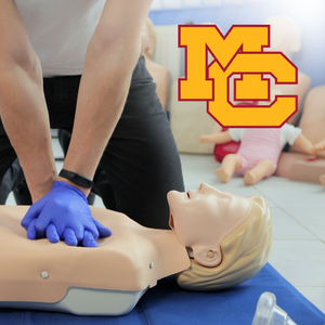CPR being performed on a dummy; logo of mt. carmel high school