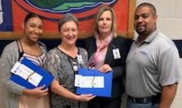 St. Landry Homestead donation clipboard to BCHS teachers