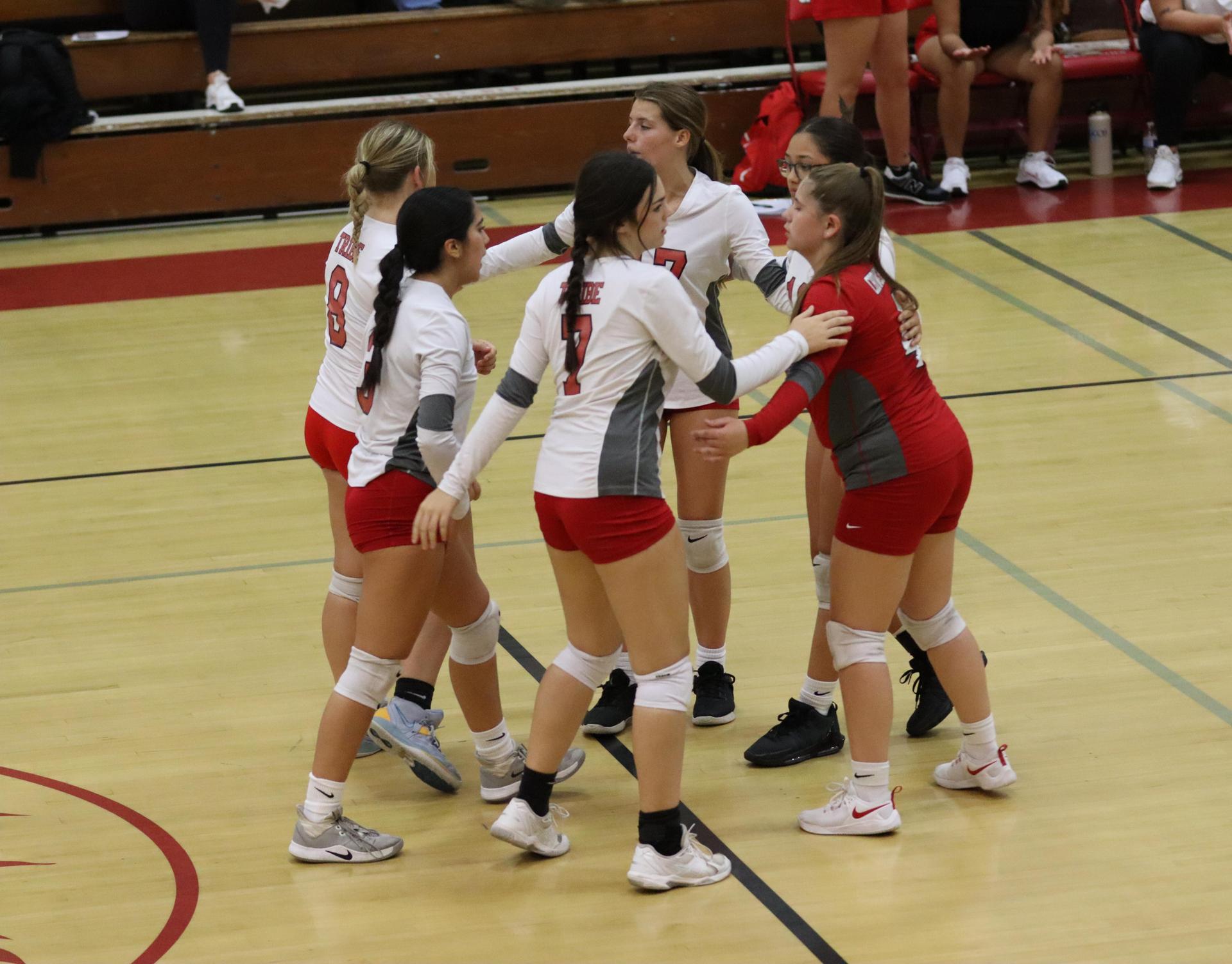 junior varsity girls playing volleyball against Liberty