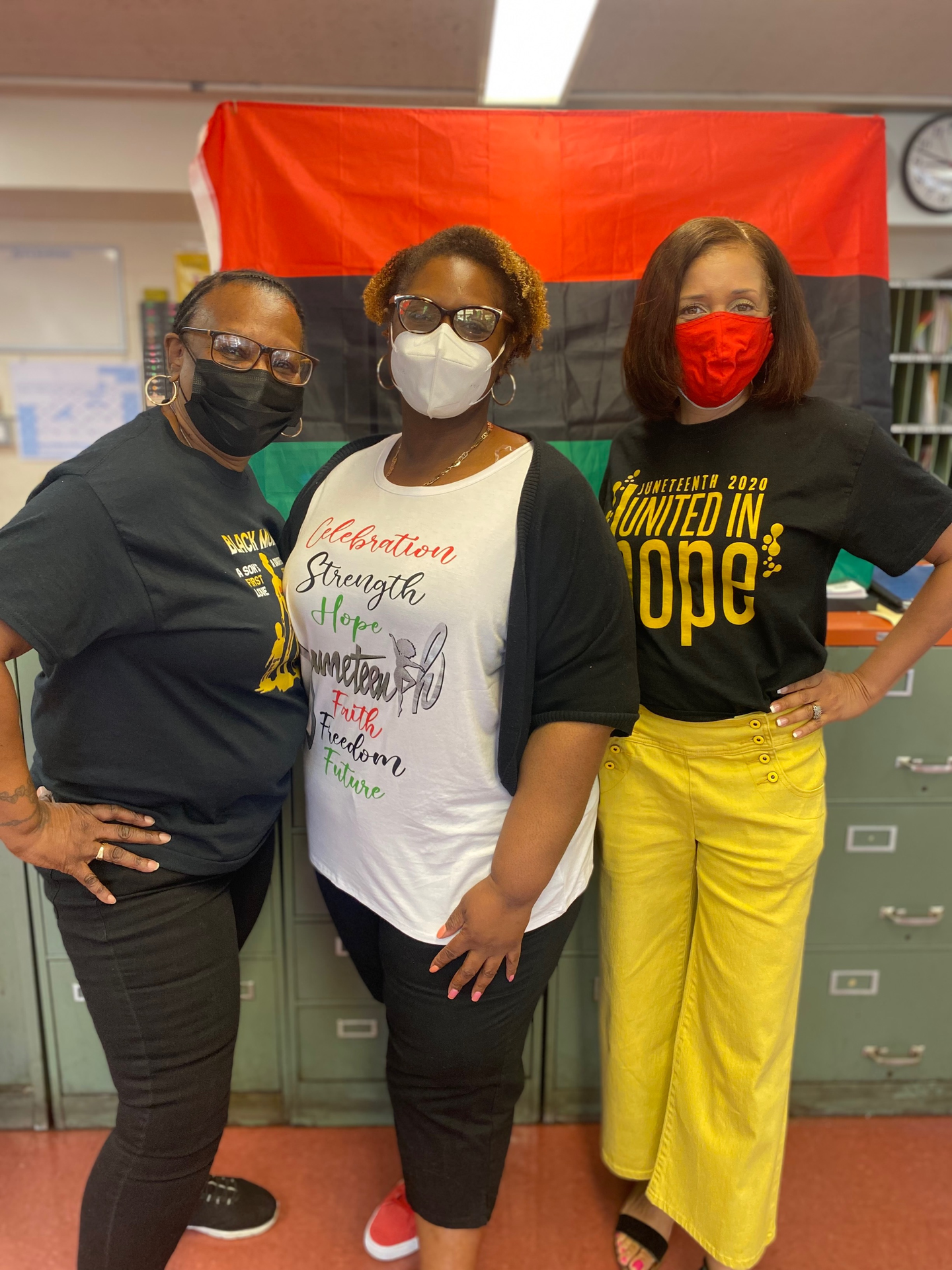 Ms. Bell, Ms. Marshall, and Dean Bratton representing Juneteenth colors!