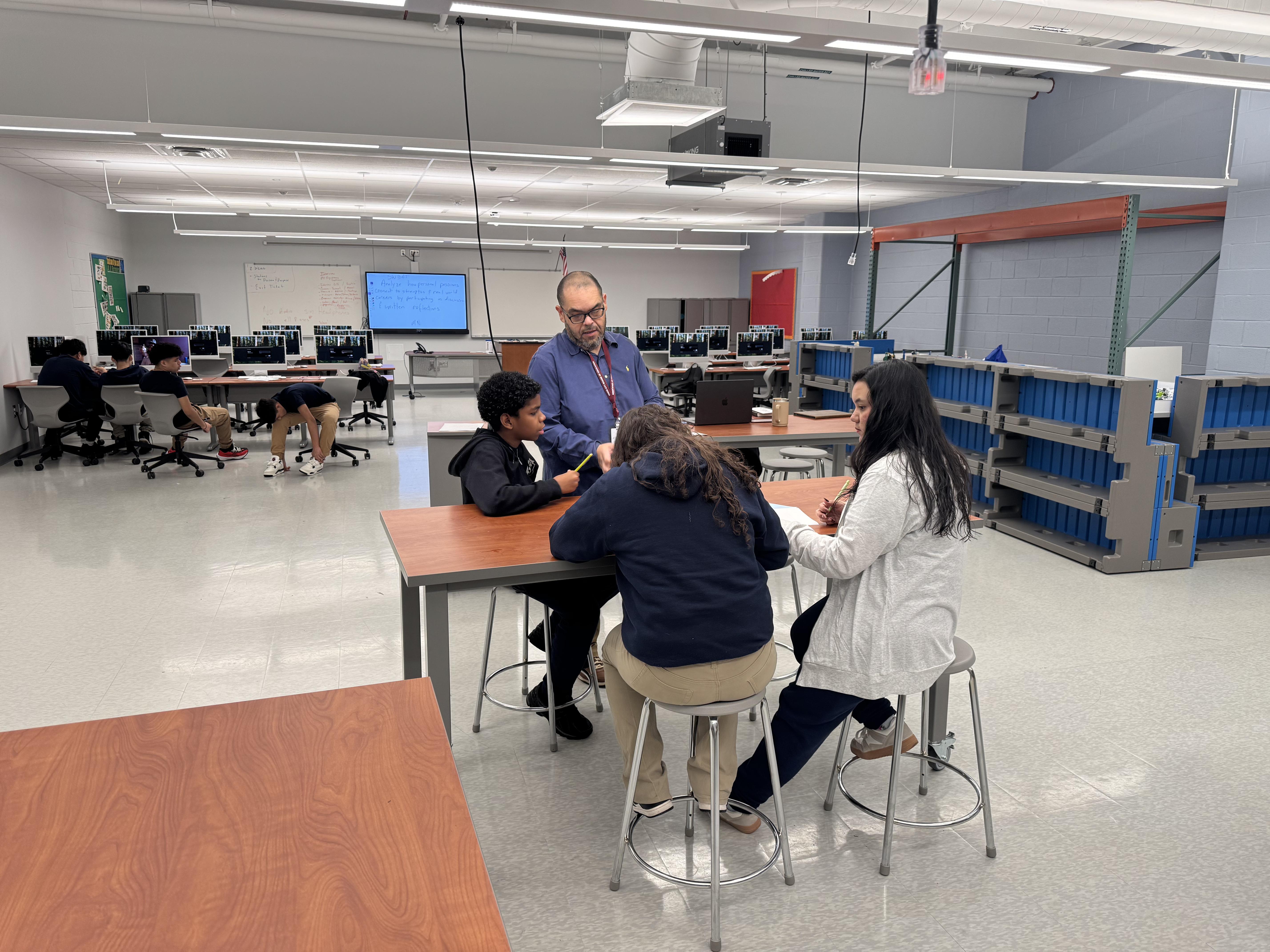 Mr. Navas with students at the Esther Salas Academy