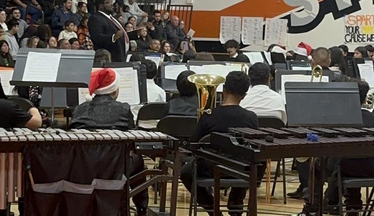 The FMS Band performing in the high school gym.