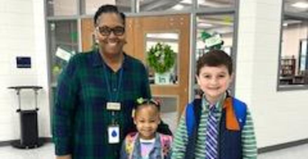 Teacher and students dressed for Wacky Day