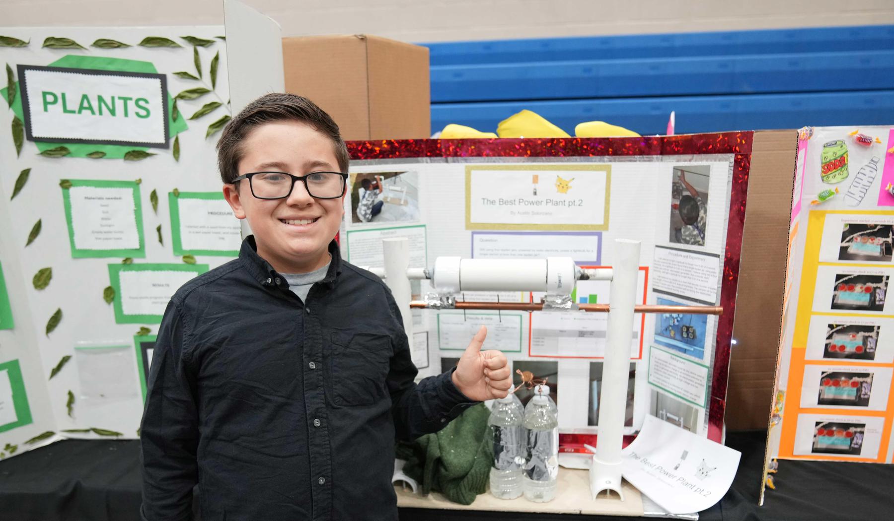 boy with science fair project