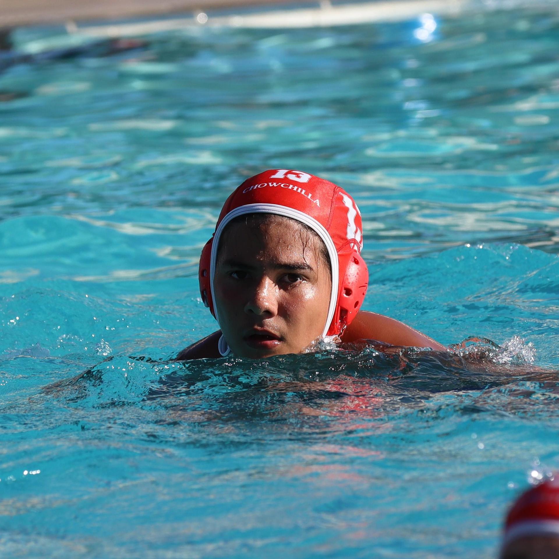 boys playing water polo against Madera