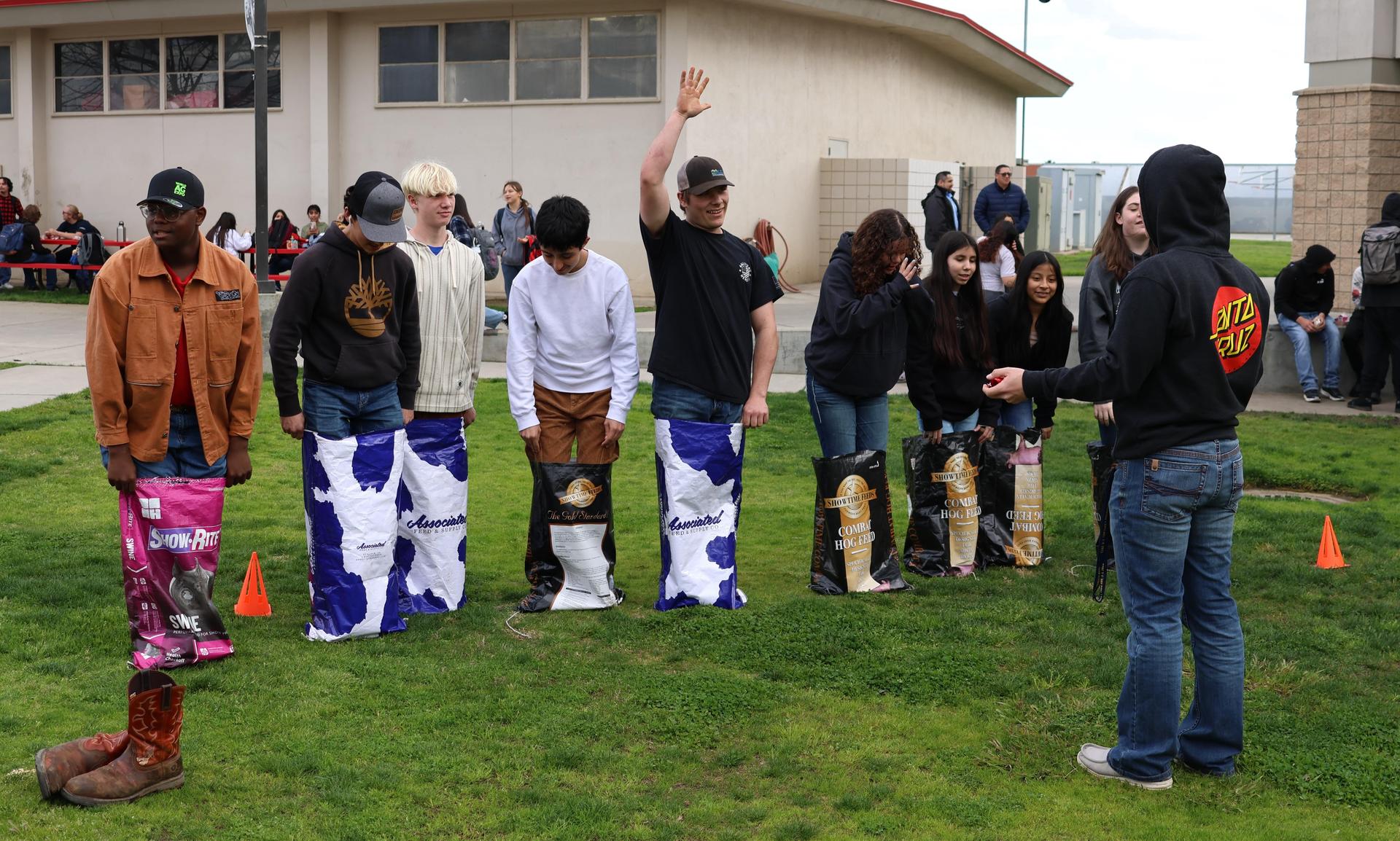 students and staff enjoying the feed bag relay