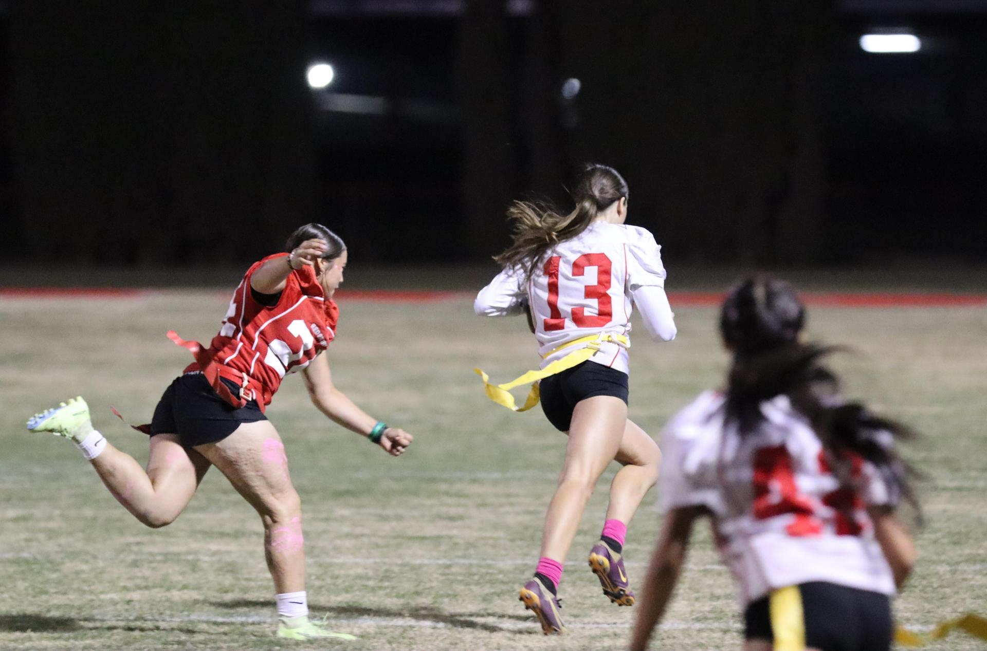 girls playing flag football