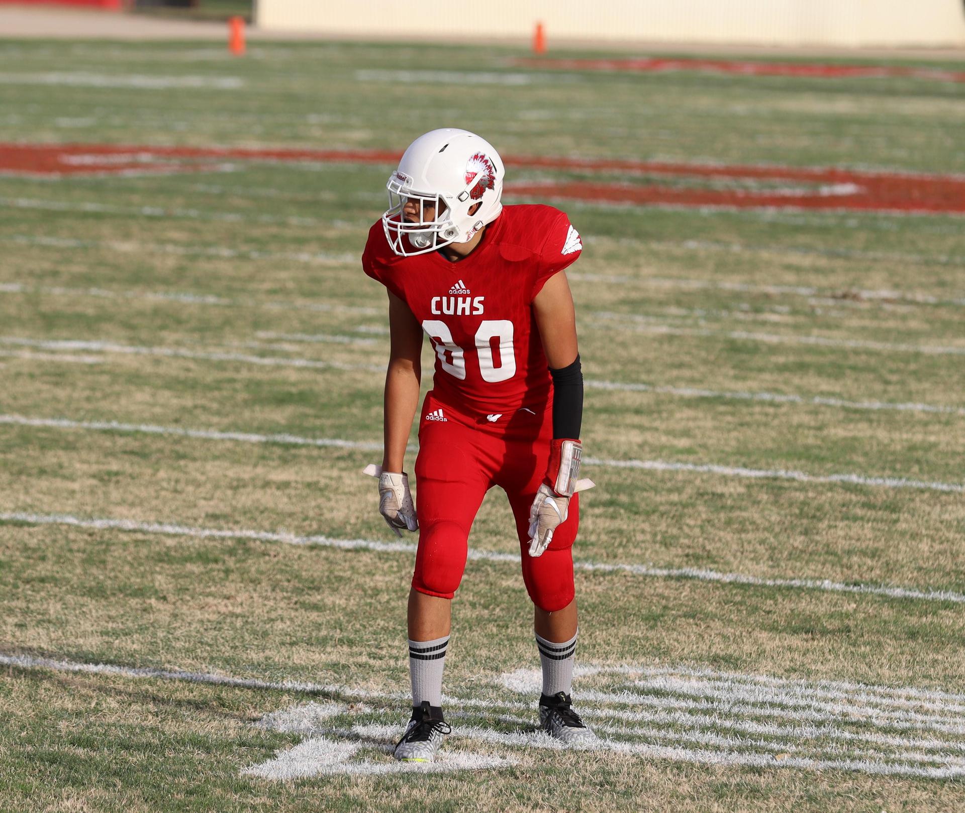  junior varsity football players in action against riverdale