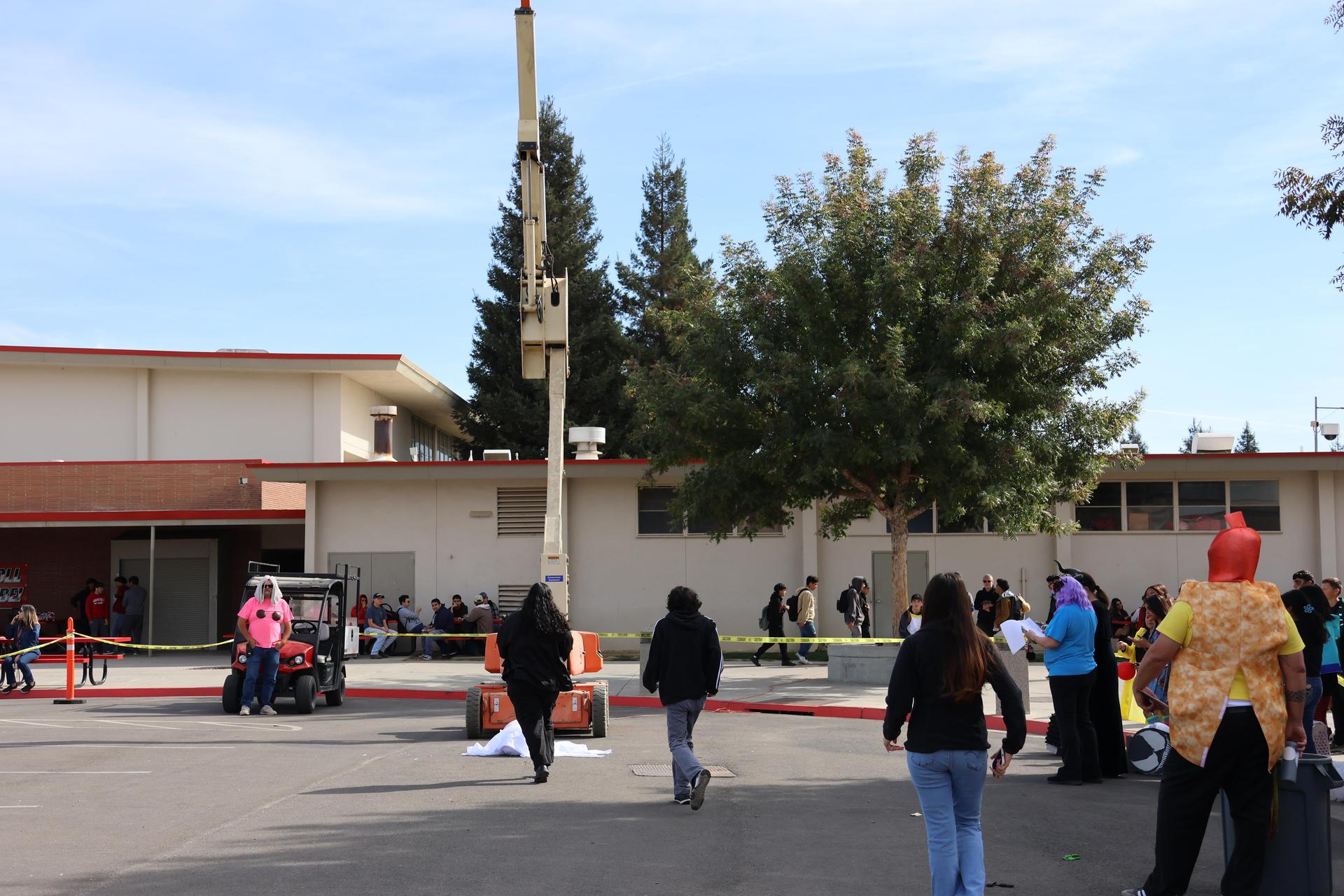students and staff enjoying the pumpkin drop