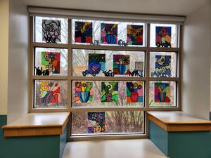 Vases displayed on window out of pastel