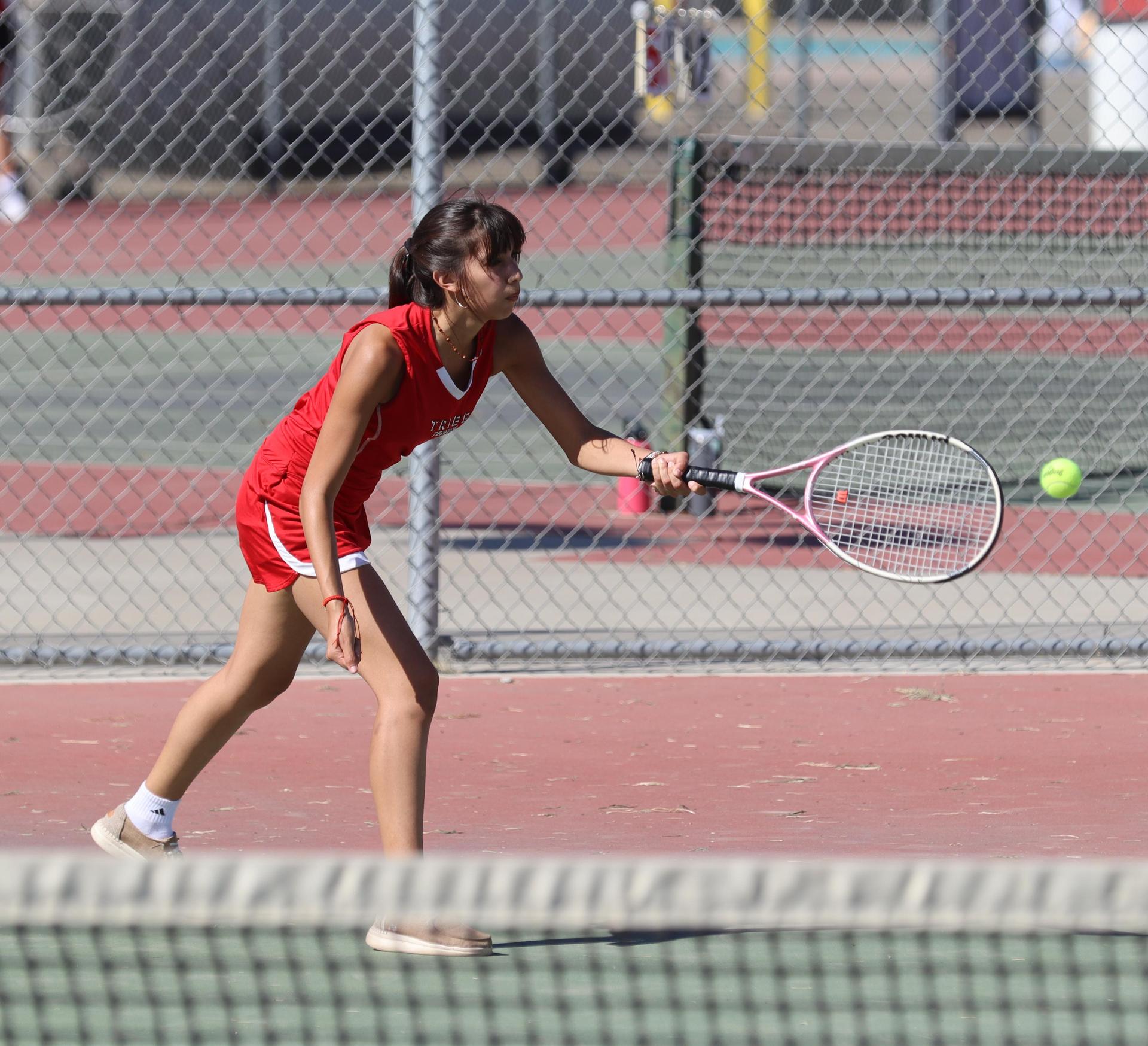 girls playing tennis against Golden Valley