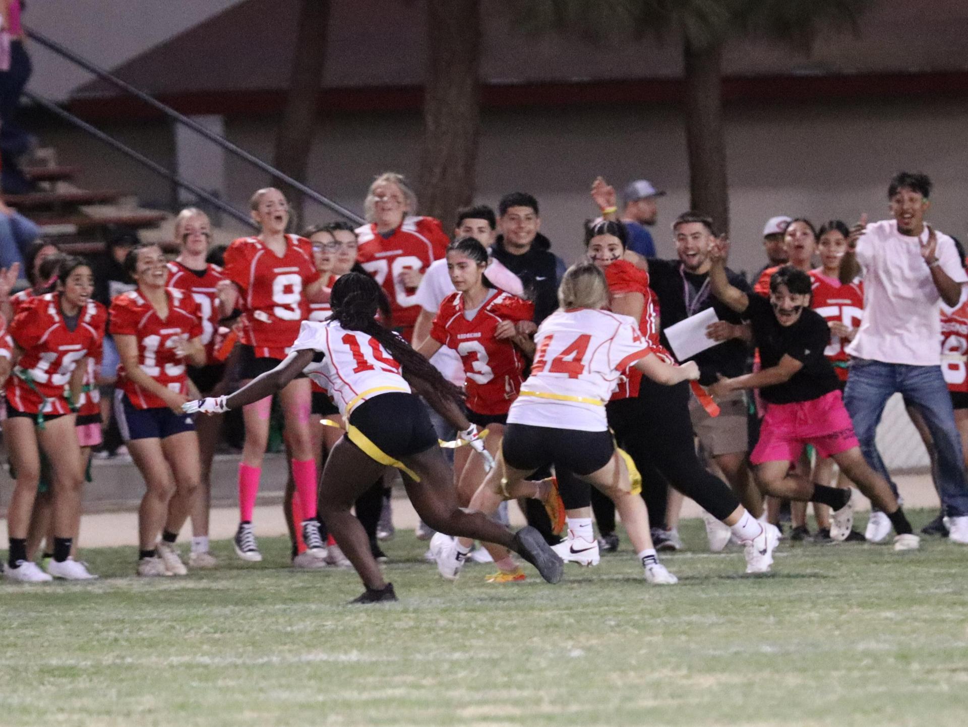 girls playing flag football
