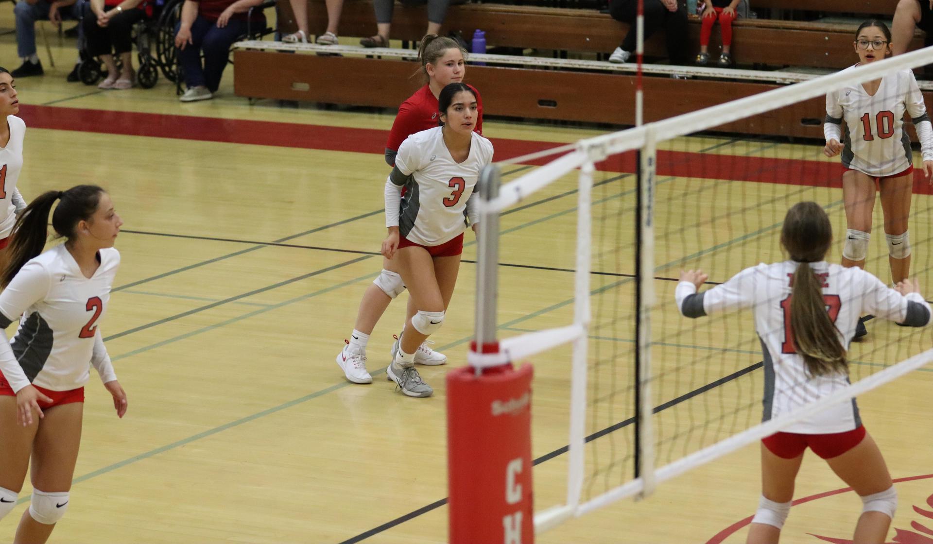 junior varsity girls playing volleyball against Liberty