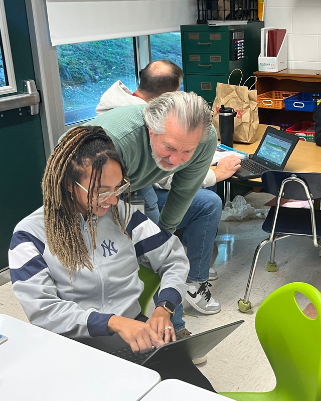 Mr. Mastrangelo works with a teacher