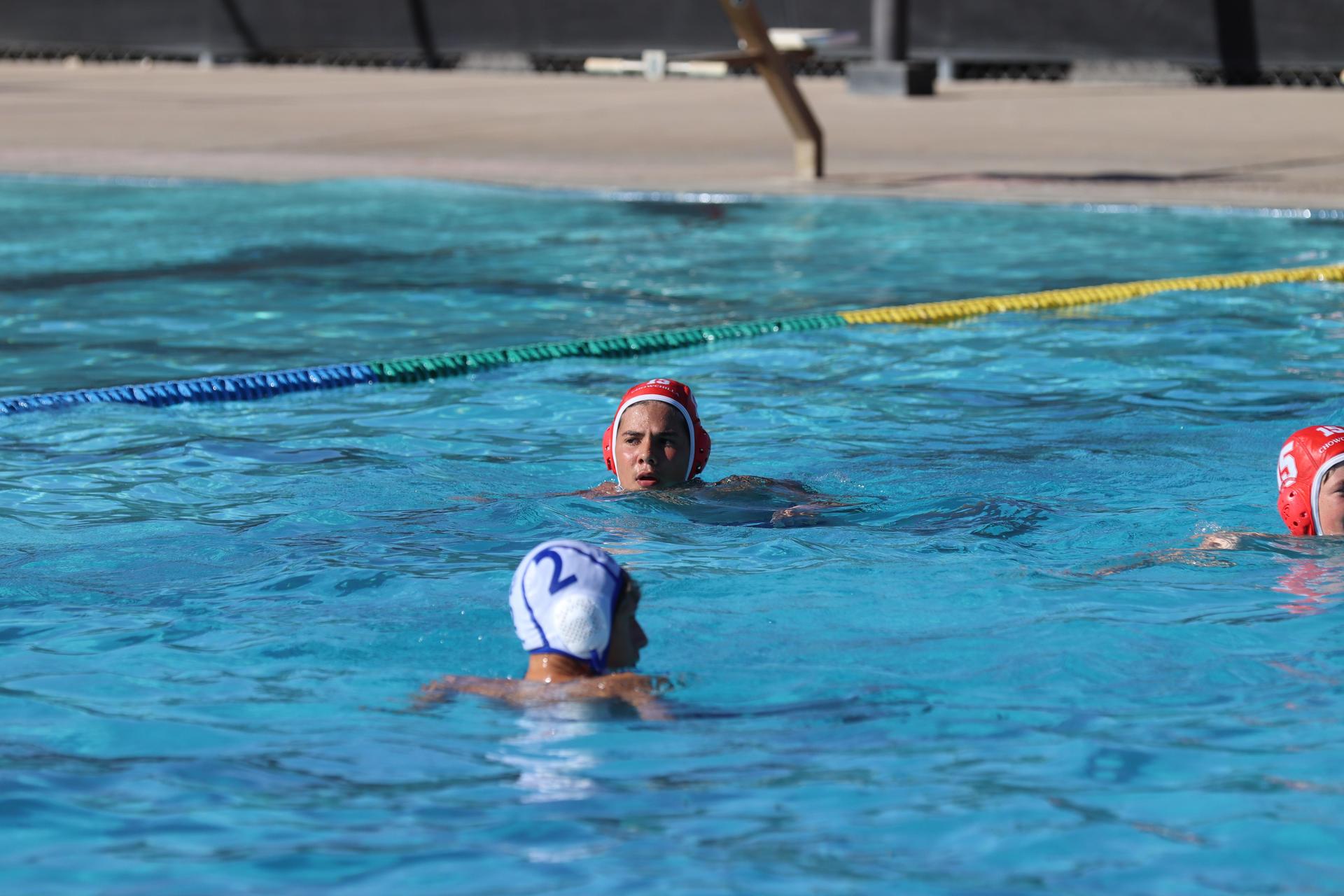boys playing water polo against Madera