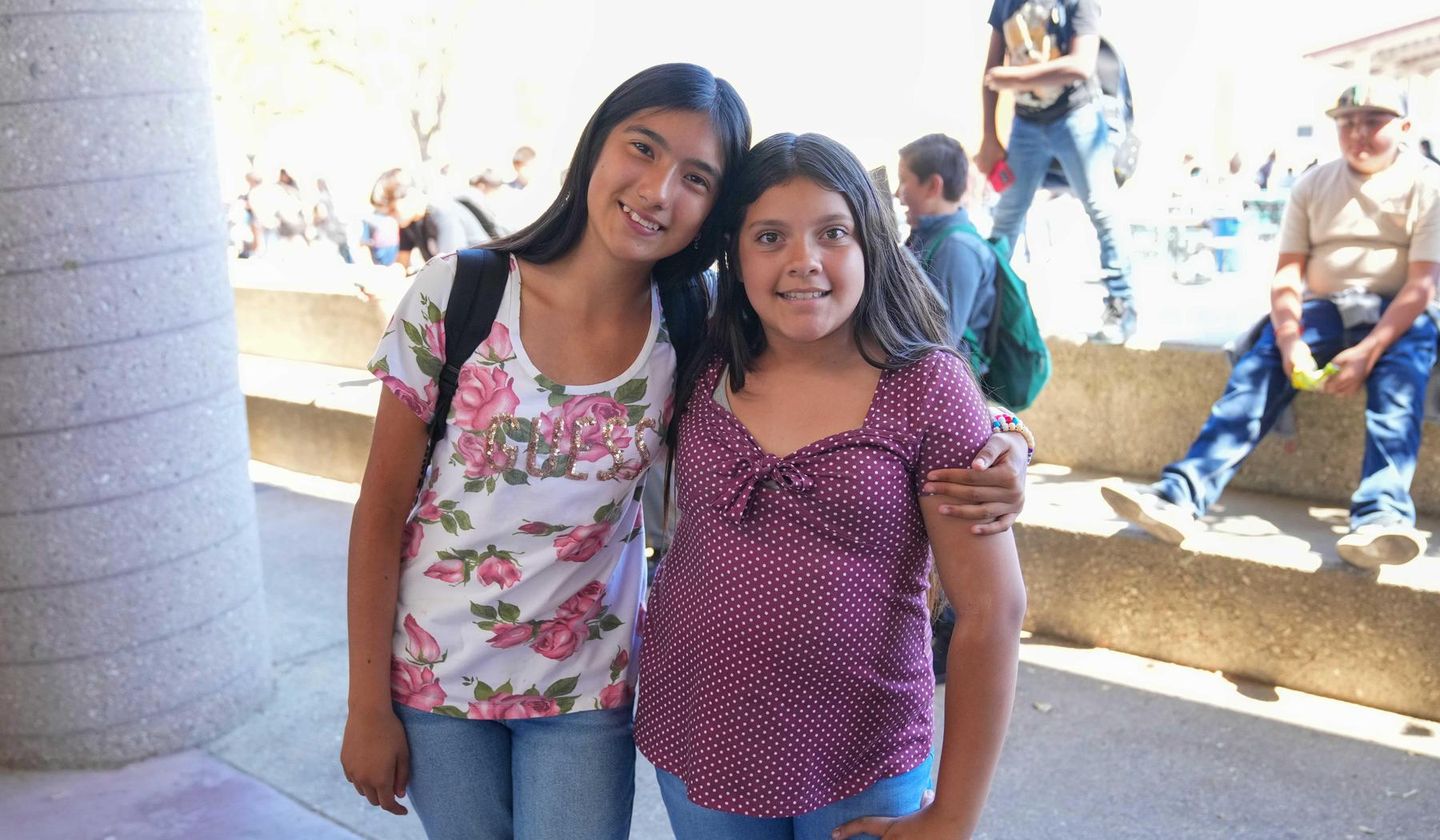 two smiling middle school girls