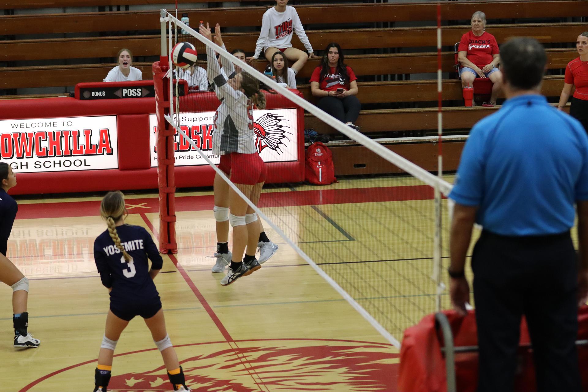junior varsity girls playing volleyball against Yosemite