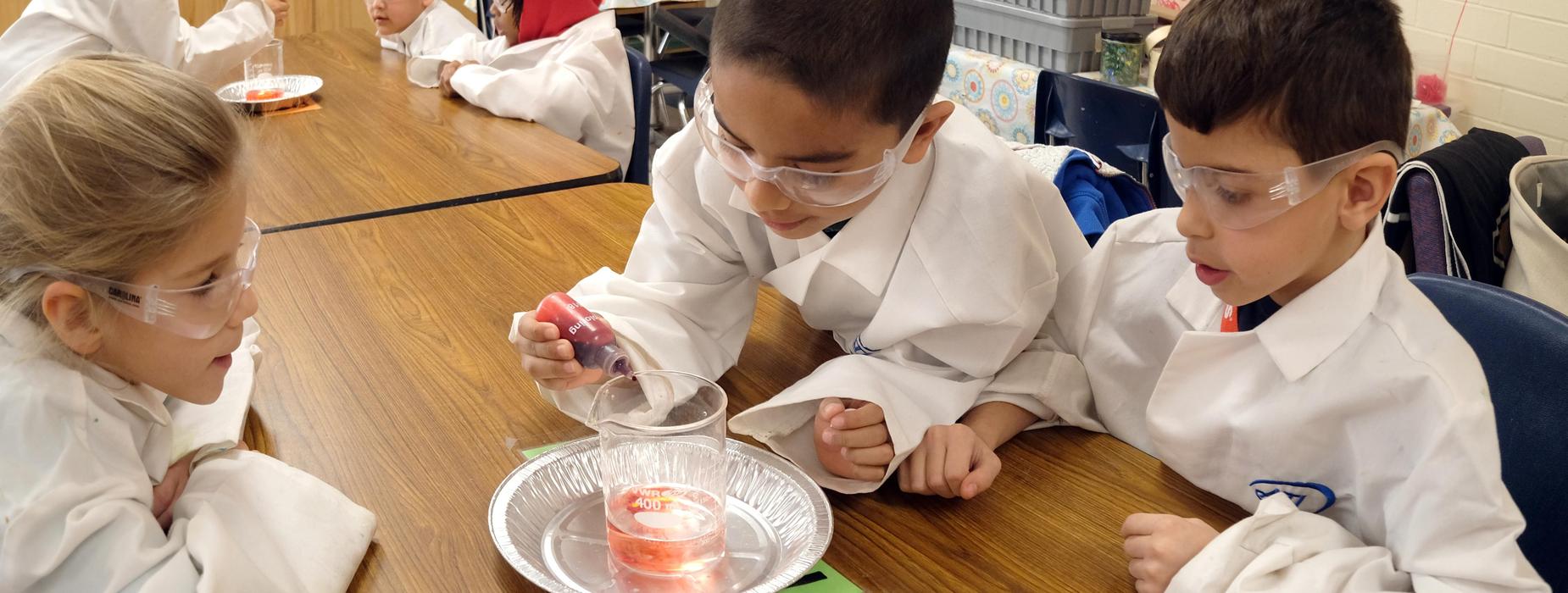 Kids doing a science experiment