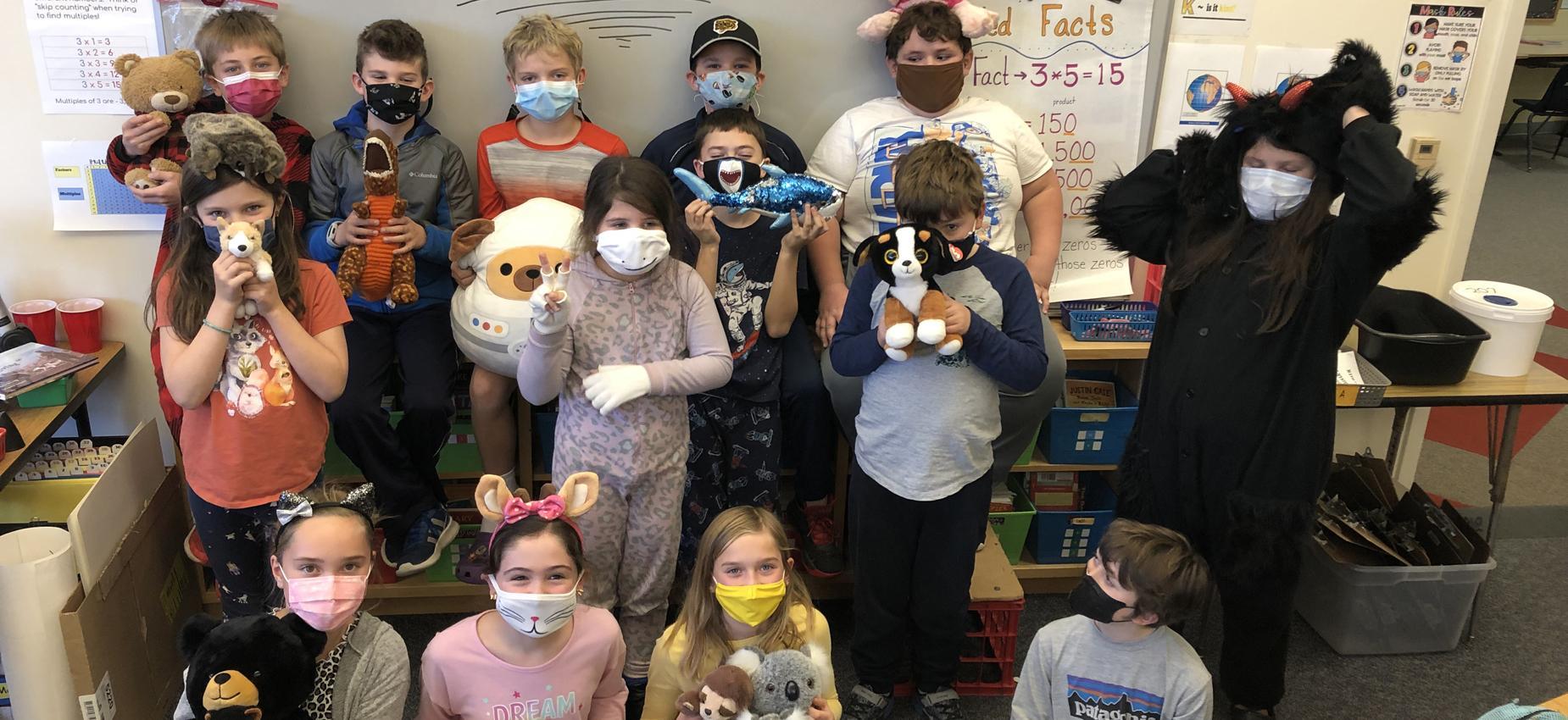 students with stuffed animals