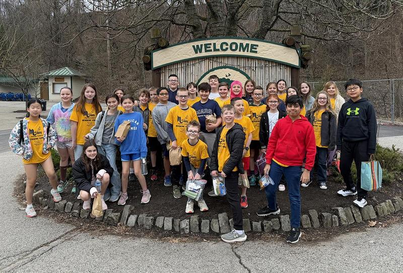 a large group of students posing for a picture
