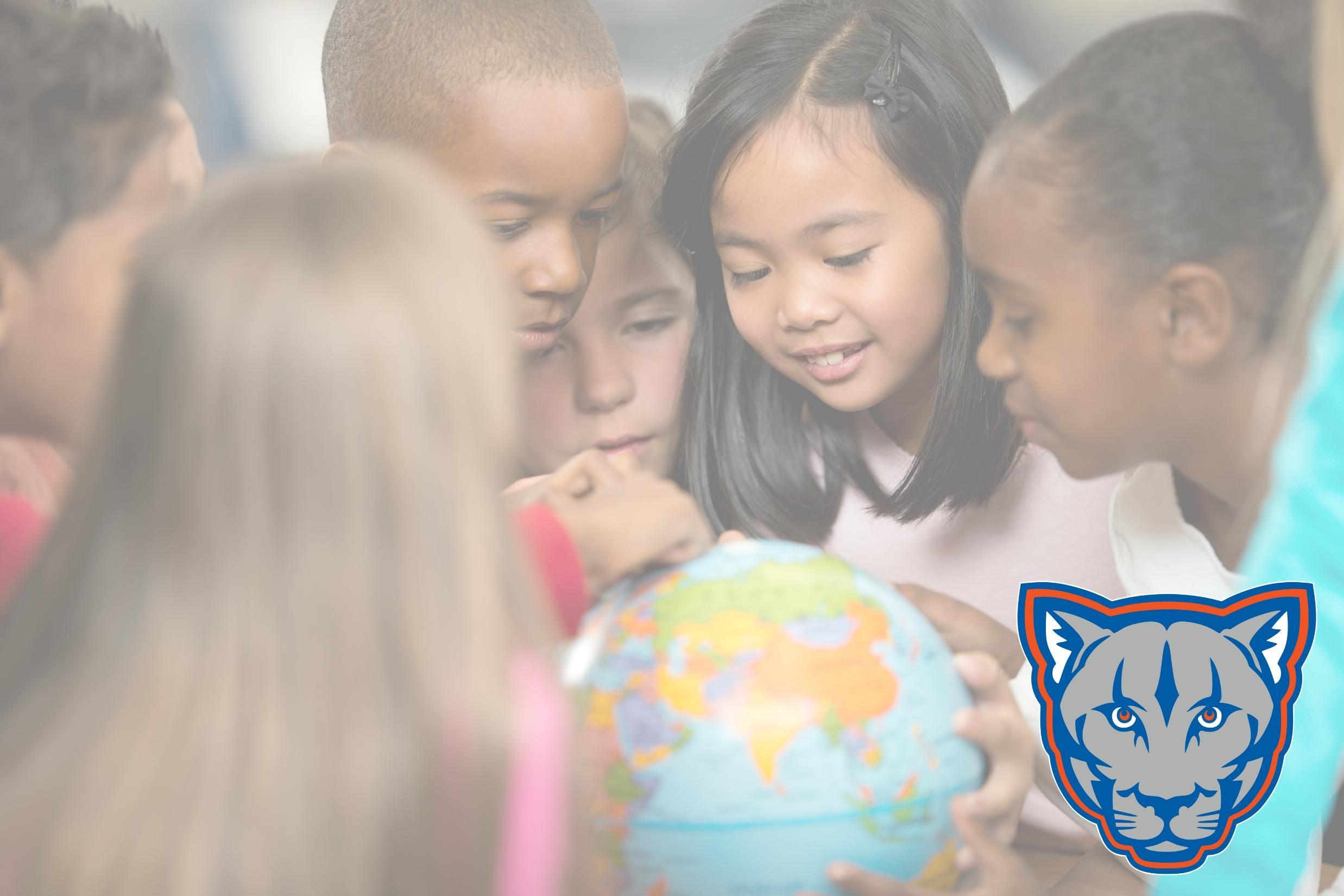 children gathered around a world globe
