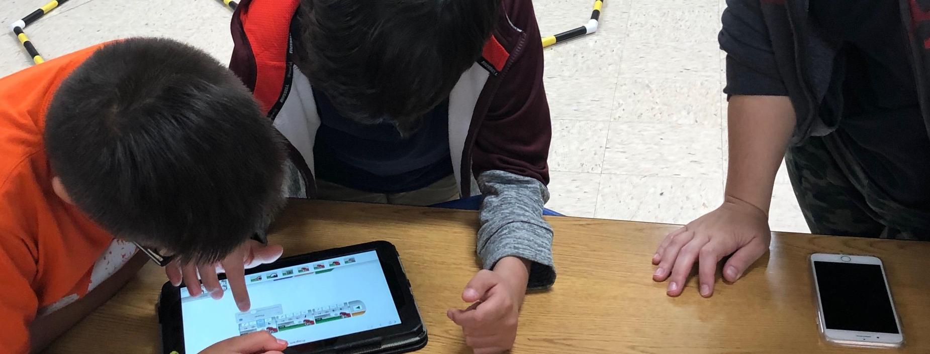 Students working at programming.