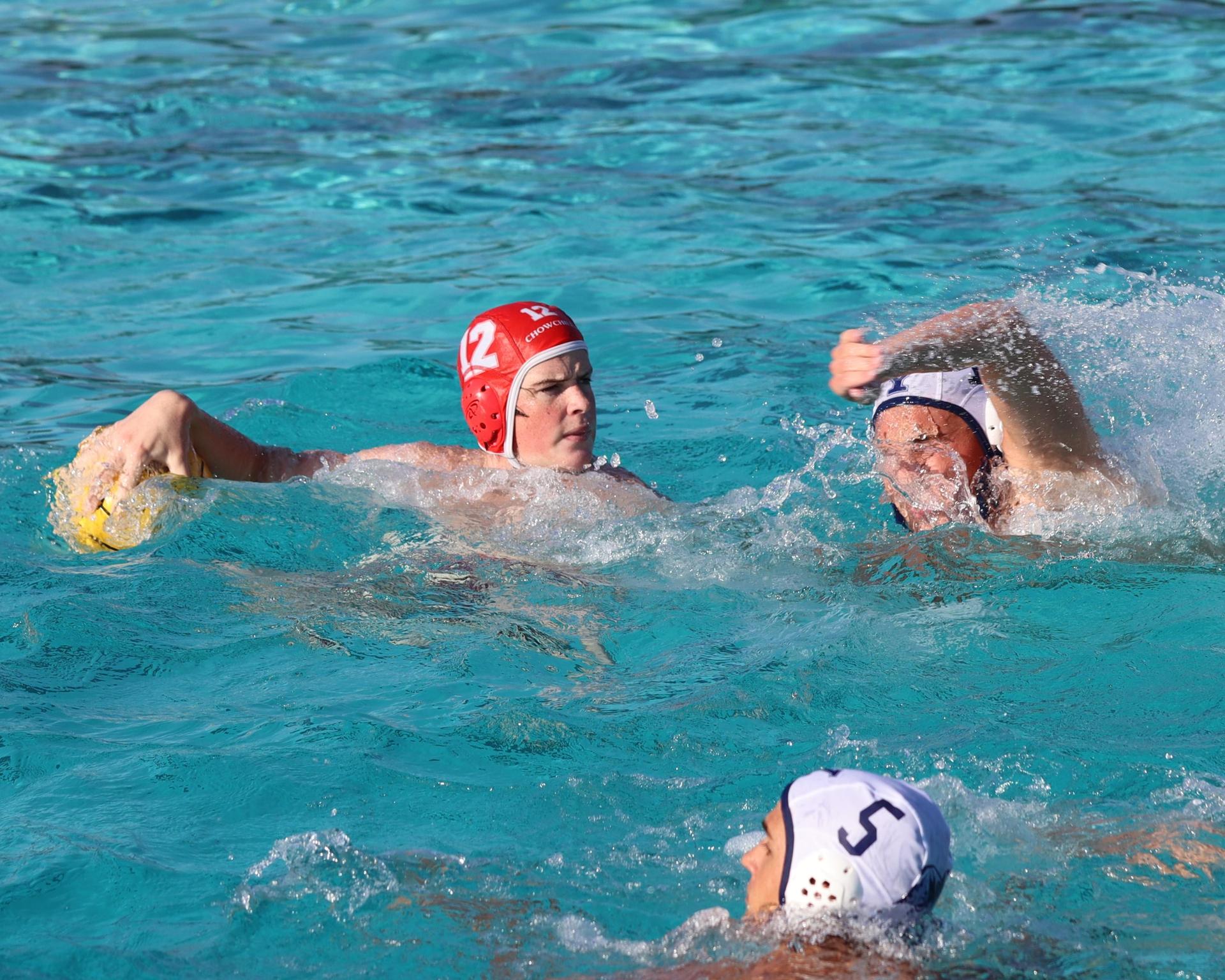 Boys playing water polo against Yosemite