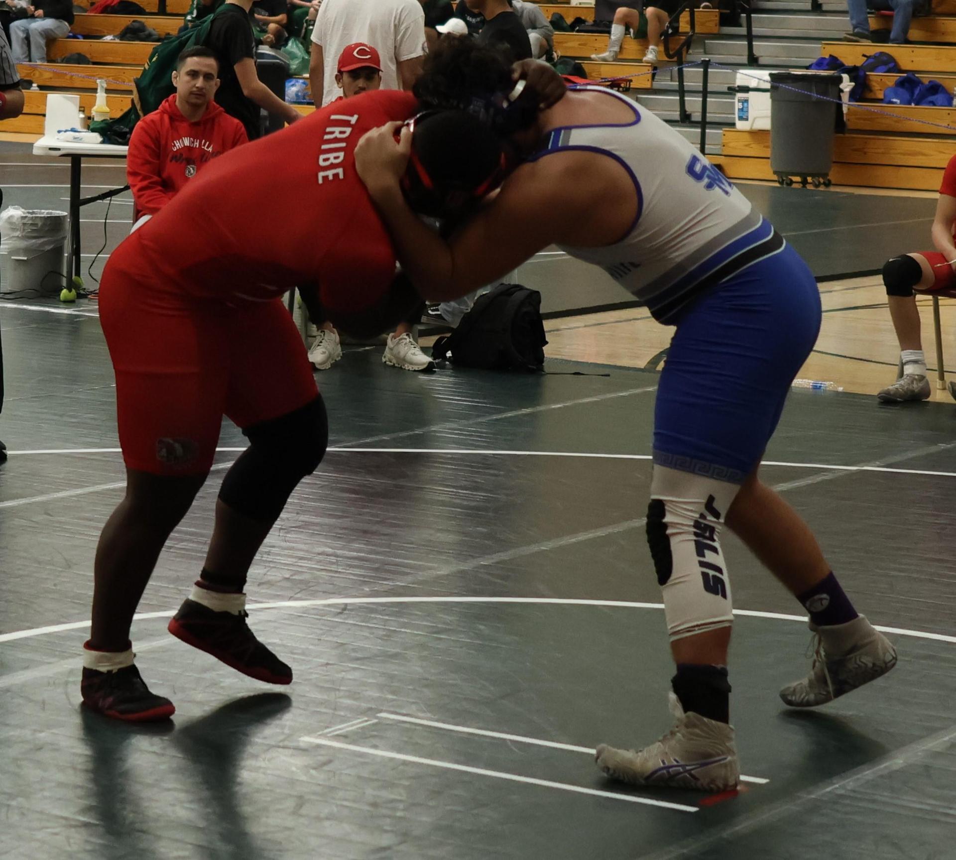 Boys wrestling in the Liberty Duals event 136