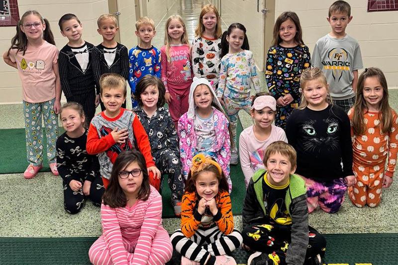 Sunrise first-graders dress in pajamas for the day’s theme, “Follow your dreams; don’t do drugs”