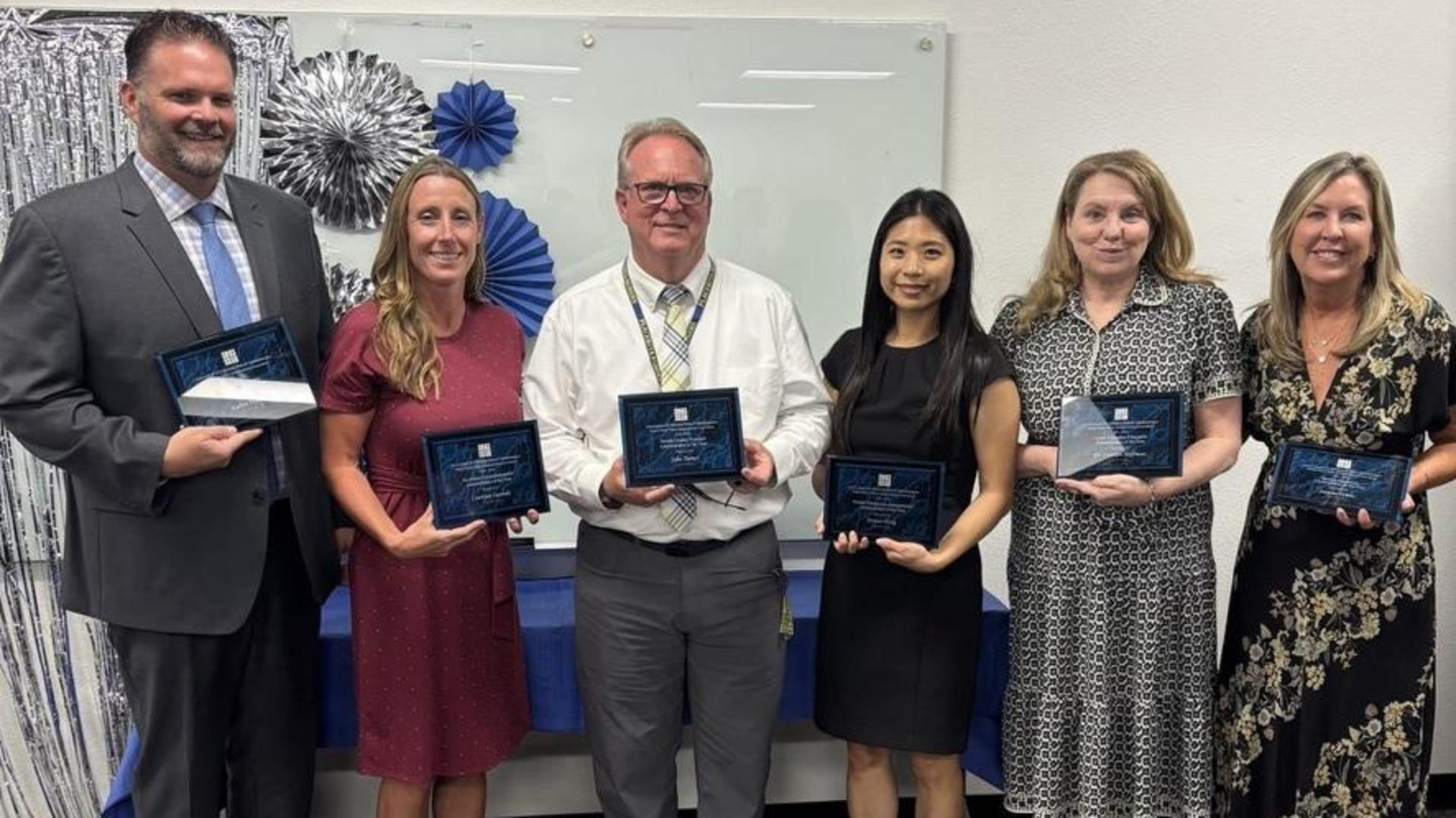 Mrs. Hong receives awards