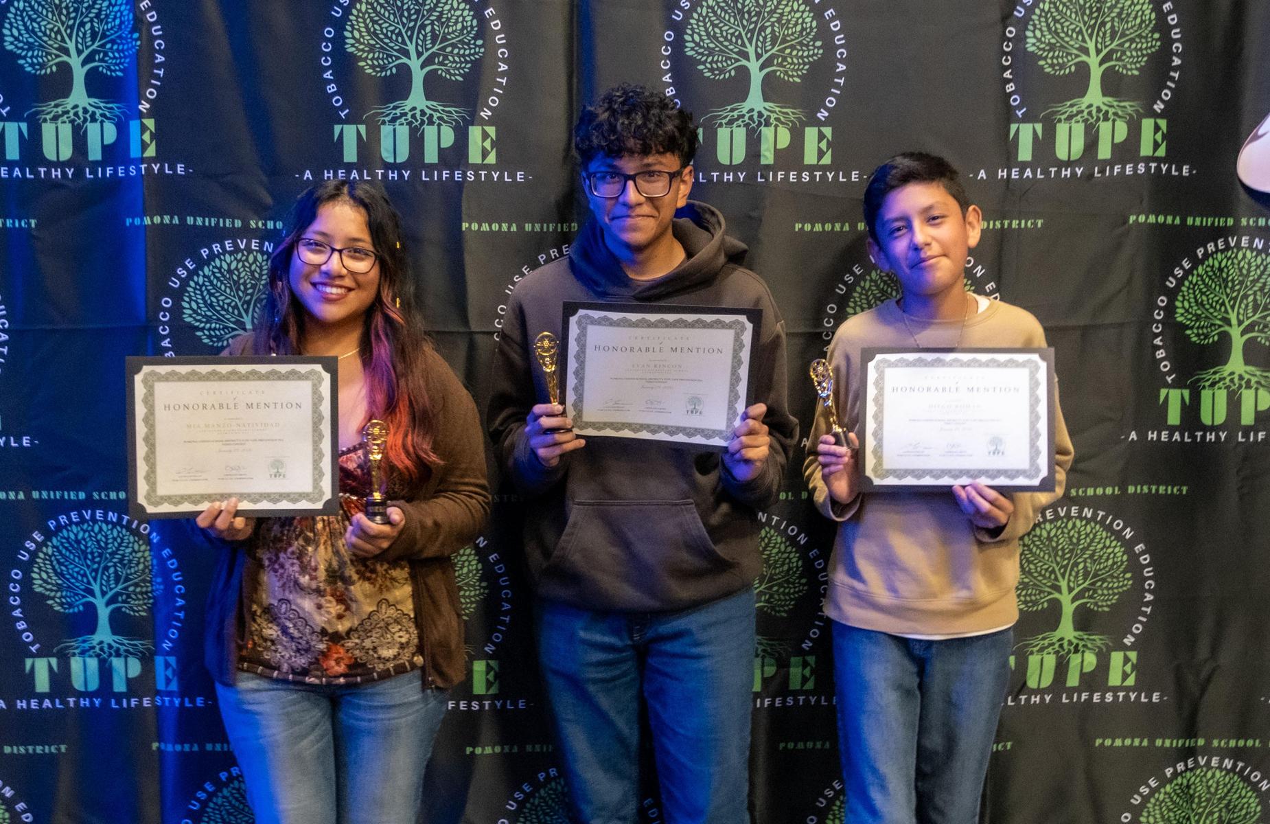 3 students in backdrop