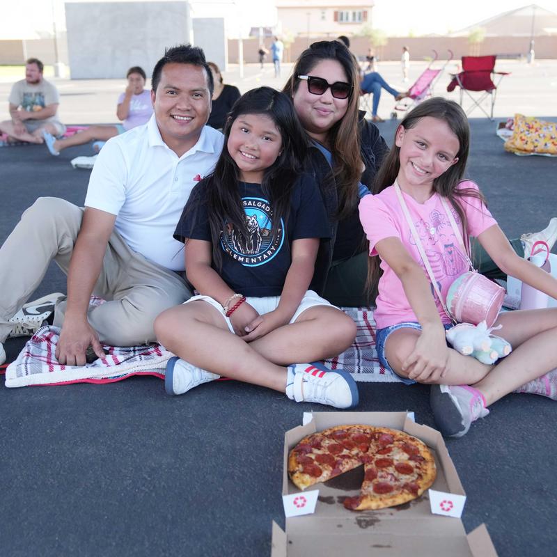 Family enjoying pizza at Rose Salgado Elementary