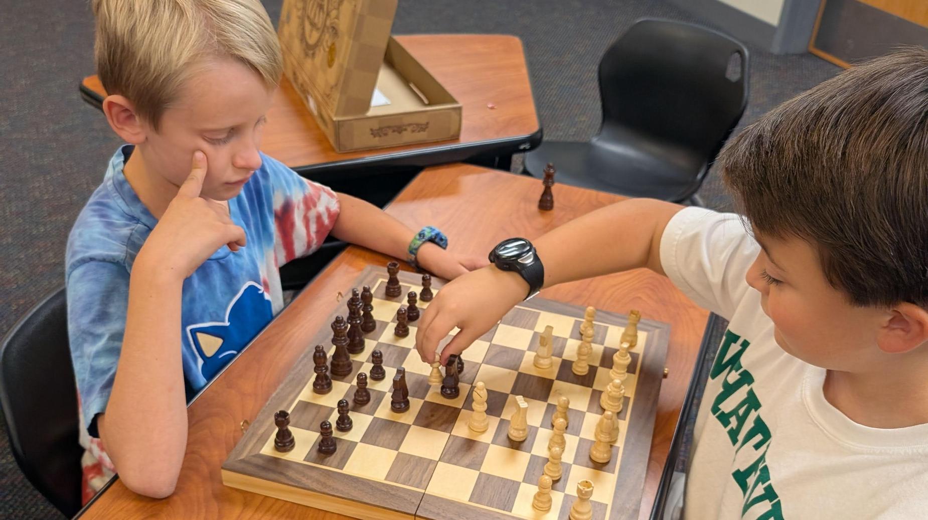Students playing chess