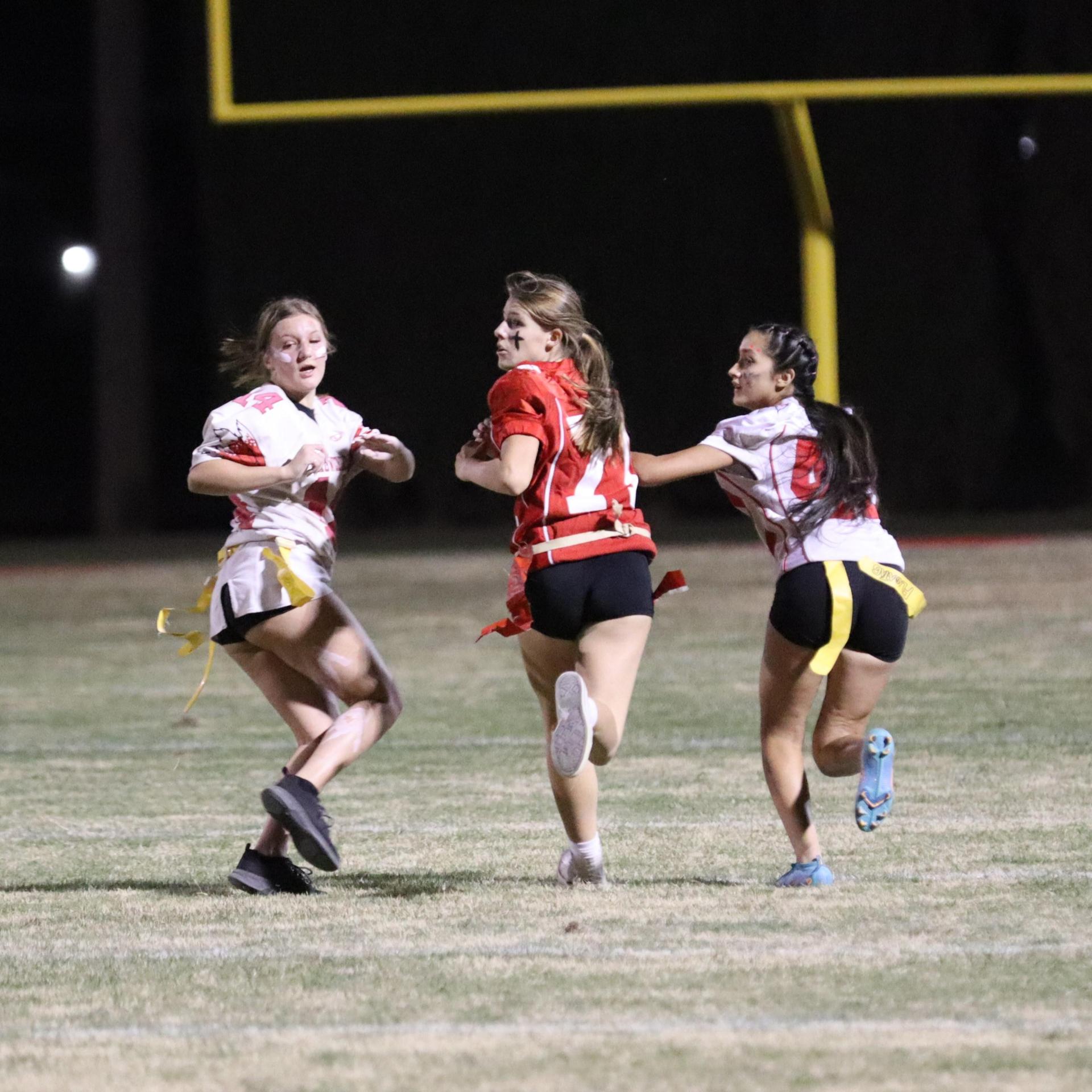 girls playing flag football