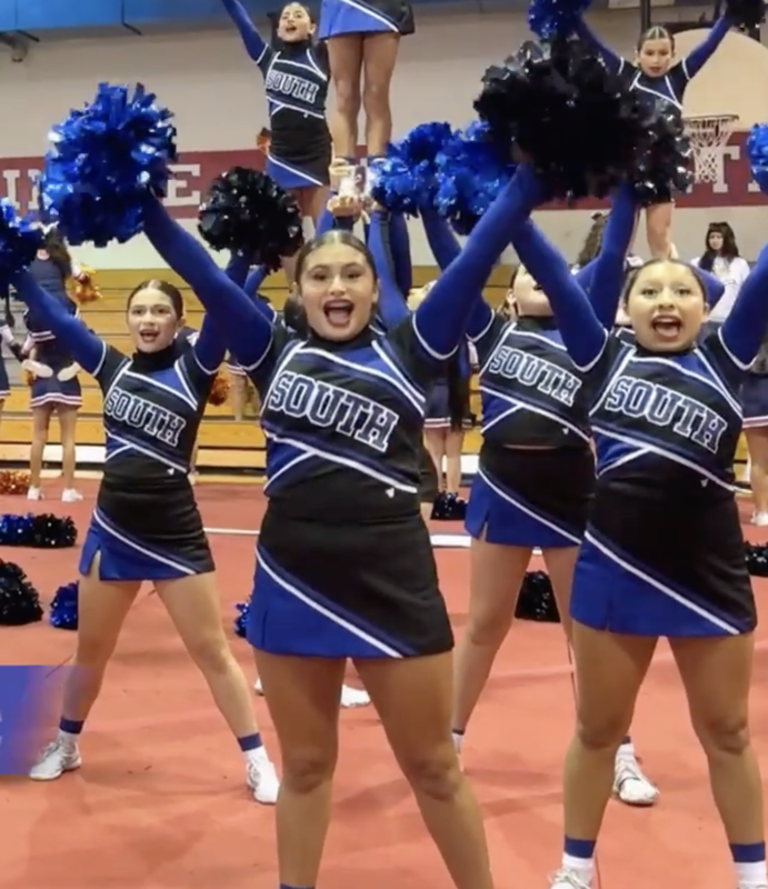 Middle School Cheerleaders doing a routine