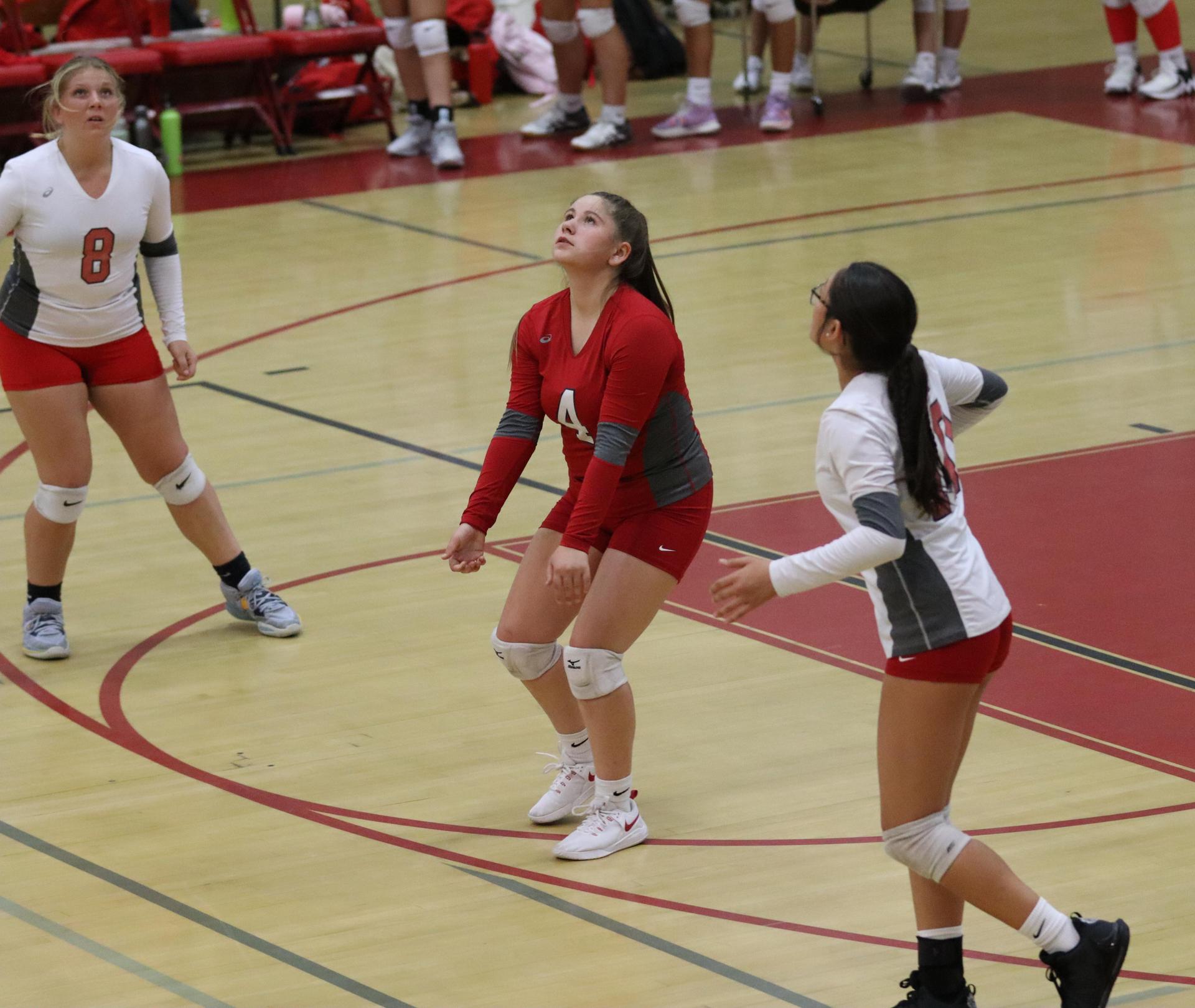 junior varsity girls playing volleyball against Liberty