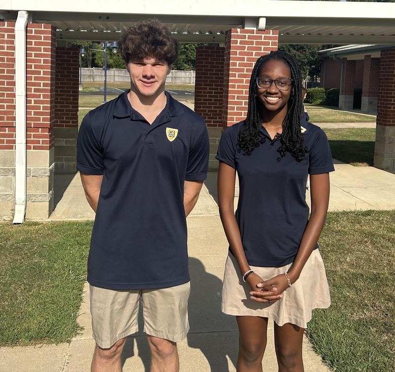 St. Joe seniors Jack Williams and Zaniah Purvis pose outside.