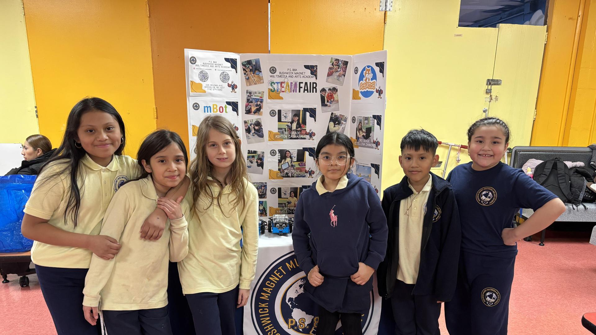 Students in front of robotics projects