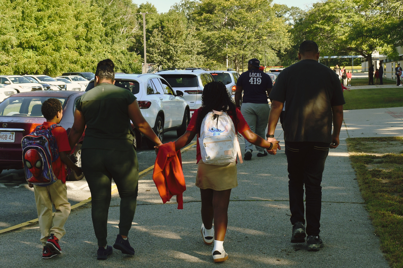 Family walking to school